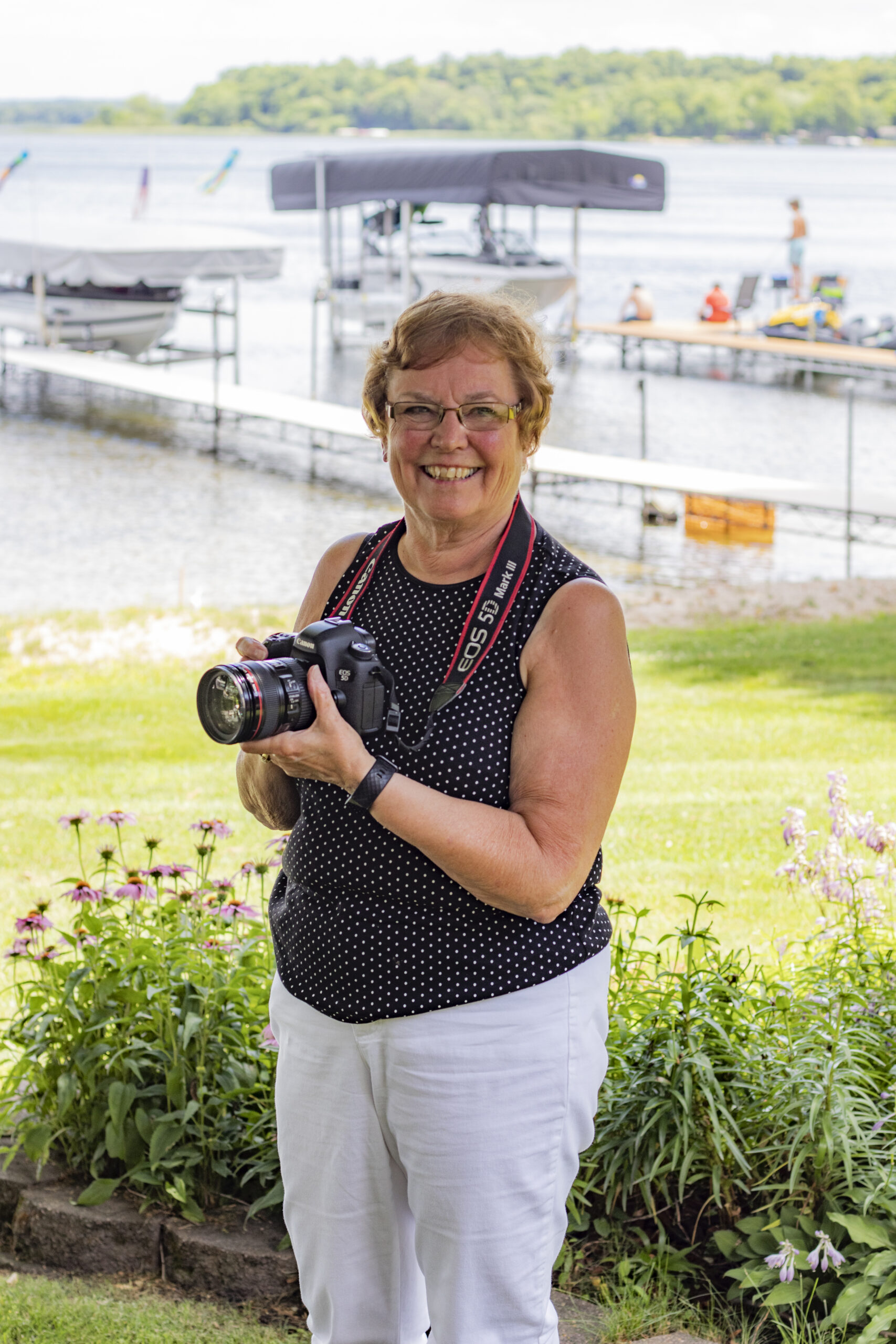 Barbara holding camera